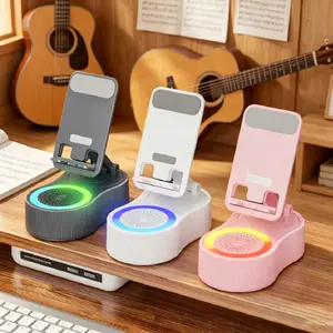 5-in-1 Wireless Induction Bluetooth Speaker Stand with Foldable Phone Holder, Power Bank & Ambient Light — Desktop/Home, Plastic/Metal Composite Smartphone Device