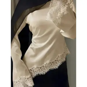 2026-2027-Lace trimmed satin lace up shirt