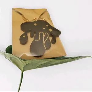 Black and gold mushroom melting dripping keychain