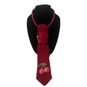 Cherry Charm Elevated Tie Necklace with Statement Brooch Detail Adjustable Closure for Comfortable Wear Lightweight and Easy to Style Perfect for Blazer Blouse or Simple Top.