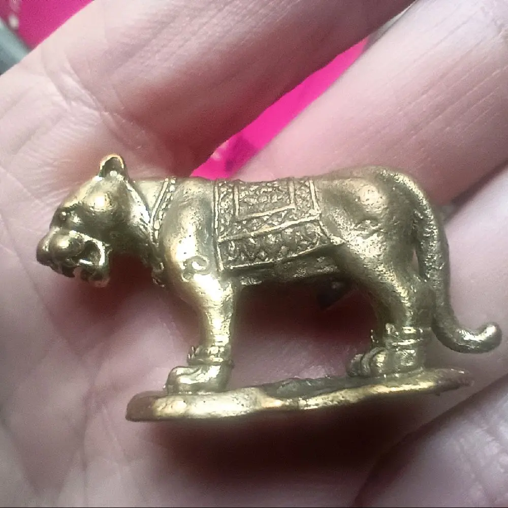 Brass metal tiger statue amulet Bangkok Thailand