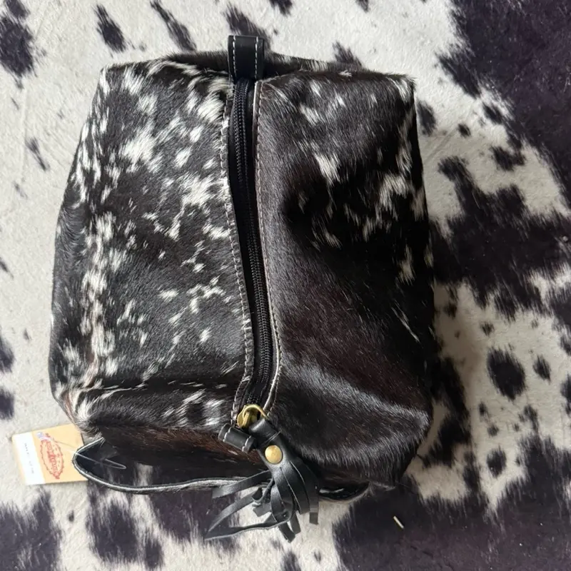 Black and white cowhide toiletry bag Black and white cowhide toiletry bag