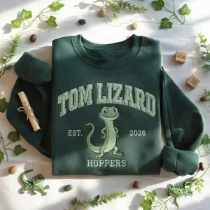 Embroidered Tom Lizard Hoppers Washed Sweatshirt, Movie Hoppers 2026, Funny Animal Shirt,, Cute Cartoon Reptile Varsity Sweater Womenswear