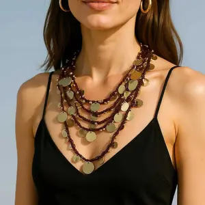 Luxurious high-end design with a waterfall-like geometric sequin round pendant and multi-layered braided rope necklace