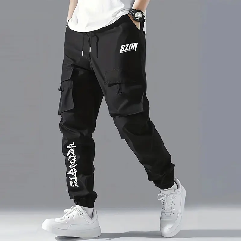 Men’s cargo jogger pants, 1-pack, for spring and autumn, featuring a letter print pattern, drawstring waist, side pockets with drawstring closures, and decorative components; suitable for holiday outings and everyday street casual wear.