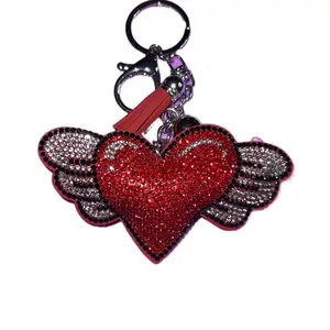 Red Winged Heart Bag Charm or Keychain with Sparkling Wings and Tassel Accents for Stylish Accessories