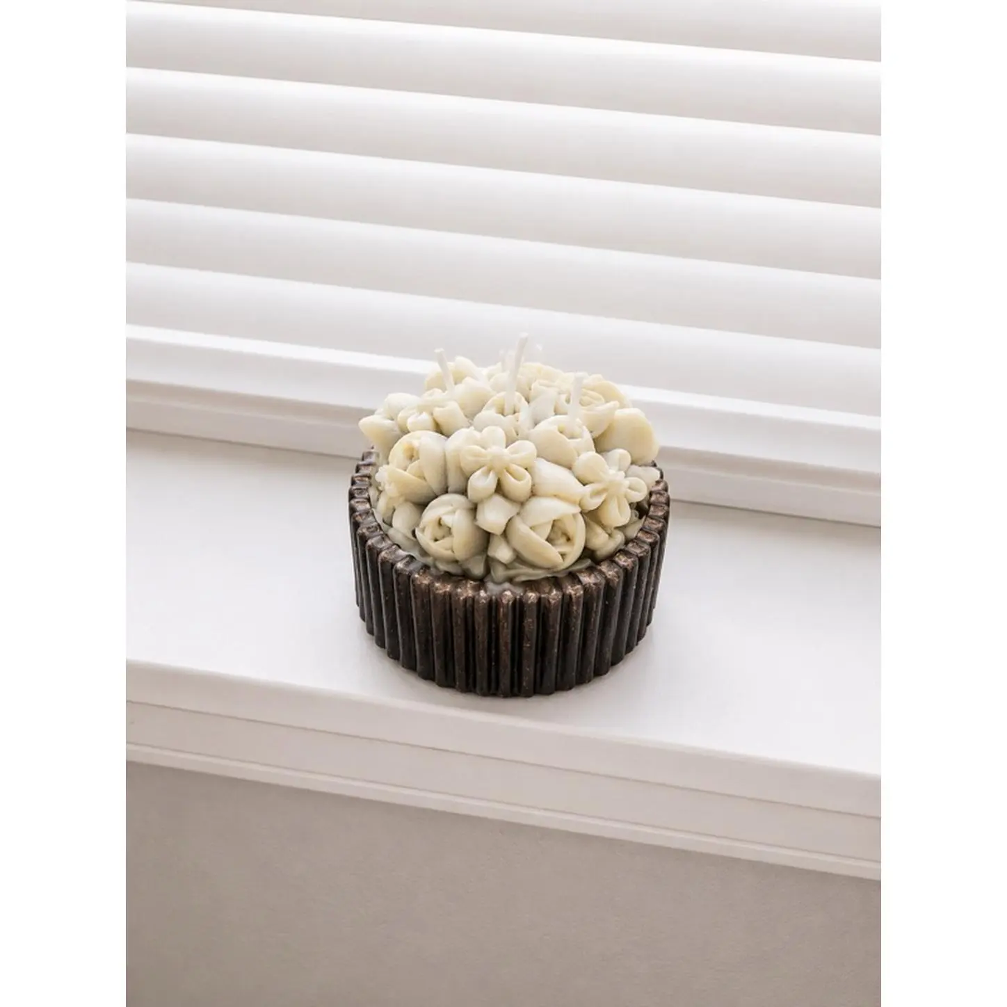 Elegant White Floral Candle in Dark Brown Holder Perfect for Home Decor and Ambiance