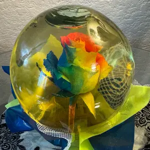 Natural colorful rose flower stuffed inside a bottle, suitable as a decoration in bedrooms and living rooms. It is a beautiful gift for occasions.