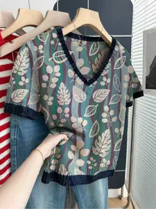 Casual loose V-neck short-sleeve knit top with contrast trim, striped splicing and leaf print. Perfect for springand summer, ideal for women's daily wear. Available in khaki and other styles