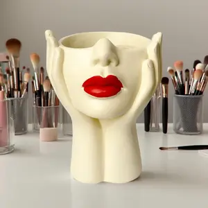 1pc artistic face modeling makeup brush bucket is a practical desktop beauty tool for storage, Makeup Organizer Box. It is a container for growing green plants and a decorative item with an atmosphere. birthday festival gift for women