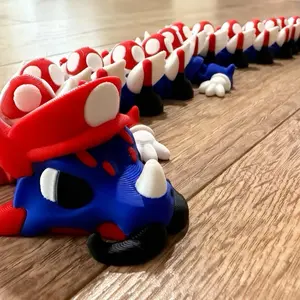 Mario-themed 3D Printed Toy Figure with Red and Blue Colors and White Details
