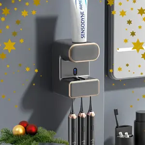 New portable bathroom wall automatic toothpaste dispenser with 3 disinfectant toothbrush slots, home automatic toothpaste dispenser with sensors, a good item for home use