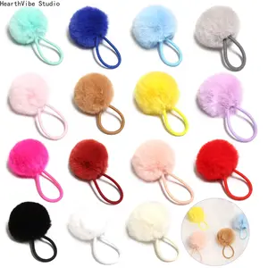 Cute and versatile faux rabbit fur hair ties, pom-pom hair ties, and matching hair accessories.