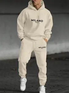 Street - style men's winter set. The combination of a half - placket zipper hoodie and sweatpants, with striking "MILANO ITALY" text prints. The off - white color is fashionable and versatile, the loose fit conforms to street trends, and the fleece - line