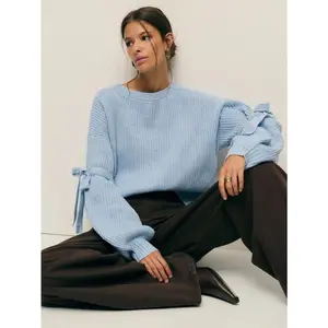 Chic Blue Sweater With Bow Sleeve Detail. Cozy Knit Pullover Featuring Balloon Sleeves And Tie Accents. Perfect For Elegant Winter Outfits, Casual Chic Looks, And Layering With Skirts Or Jeans. Fabric Knitwear