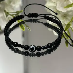 Adjustable Protection Bracelet - Black Beaded Design with Eye Motif - Flexible and Stylish Accessory