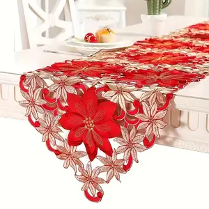 The manufacturer sells Christmas red hollowed out embroidered tablecloths, table flags, meal mats, and plate mats