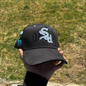 Sadboyz x Dandyhats Black Baseball Cap with White Logo and Colorful Patch Design
