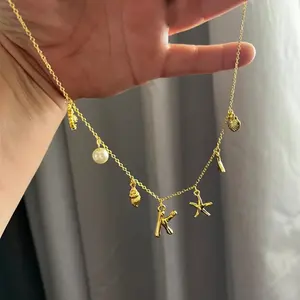 Initial Necklace Summer Beach Jewelry Initial Necklace with Seashells Starfish Pearl Accessories Letter Choker for Women
