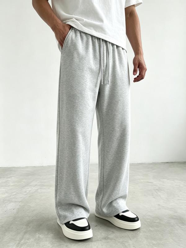 Soft thick knit wide leg sweatpants with elastic double drawstring waistband, loose floor-grazing relaxed silhouette with side seam detailing, comfy daily casual bottom staple for minimalist street mensfashion outfits Beige