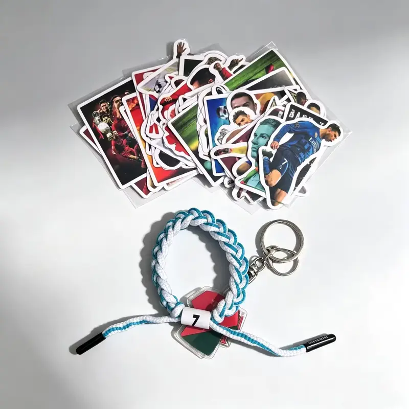 Soccer Star Number 7 Themed Mini Fashion Accessories Multipack Gift Bundle - 1 Hand-Woven Bracelet, Football Keychain, 50-Sticker Set, Unisex Sports Enthusiast Gift