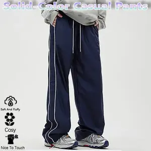 Men's trendy striped straight-leg athletic pants, featuring large pockets, a drawstring elastic waistband, and a relaxed, casual fit, perfect for everyday wear.