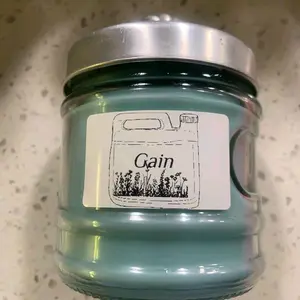 Gain Candle - Green Jar with Silver Lid - 10 oz - Scented with Floral Notes - Perfect for Home Decor