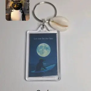 Cody Keychain with Penguin Design and Pearl Charm for Easy Access to Keys