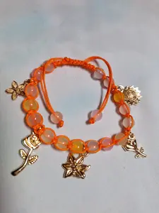 Handmade Macrame Bracelet - Vibrant Orange with Five Assorted Gold Flower Charms