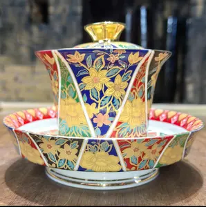 Enamel Gold Inlaid Gaiwan with SaucerTraditional Ceramic Tea Bowl Set Featuringvibrant Floral Design and Elegant GoldAccents