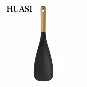 HUASI cooking spoon, 11.22 inches long, is ideal for cooking and serving. It features a durable, BPA-free matte silicone body and a wooden handle, making it a convenient kitchen utensil for stirring, scooping, and scraping ingredients.