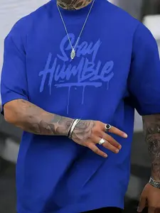"Stay Humble" Drip Graphic Oversized Round Neck Polyester T-Shirt for Men, TikTok Trendy Streetwear Top, Casual Streetwear Tops, Bold Royal Blue Design, Breathable Fabric, Loose Fit, Perfect for Daily, Urban & Casual Wear