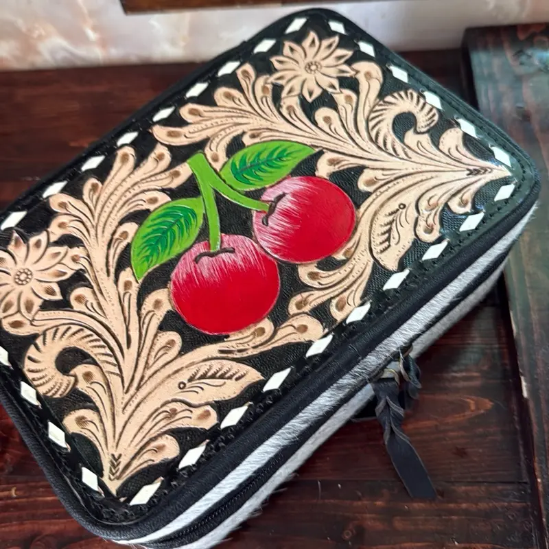 Hand-Tooled Black Leather Jewelry Box with Hidden Compartments and Cherry Design