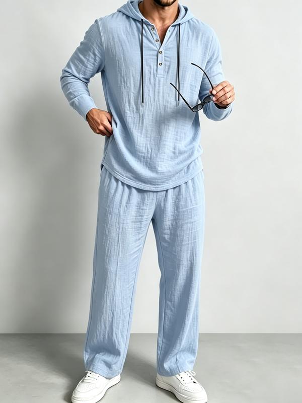 Men's lightweight casual two-piece set, long sleeved top paired with loose pants of the same color, comfortable for daily wear in spring and autumn