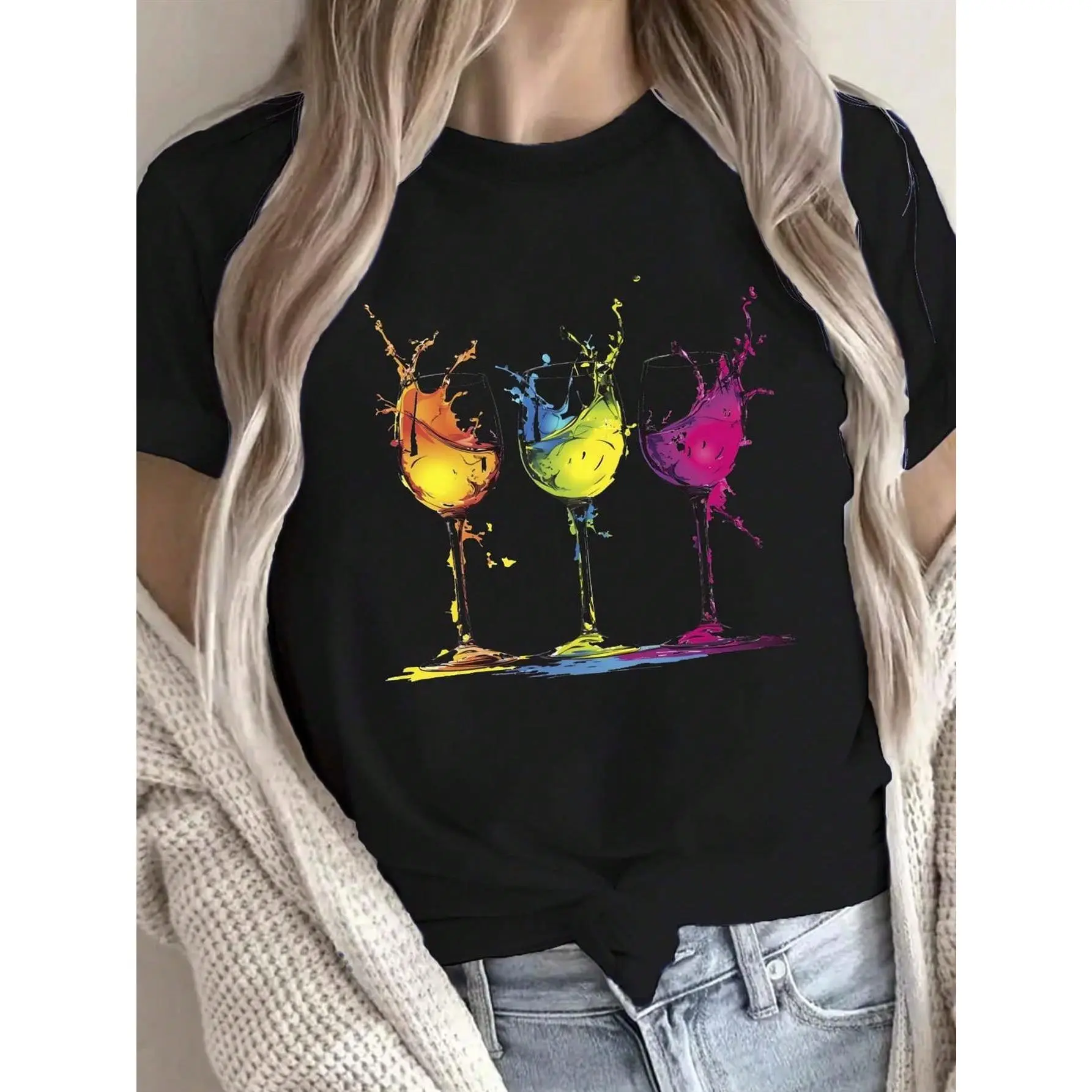 Women’s colorful wine glasses art print T-shirt featuring a vibrant splatter wine cup graphic; crew neck, short sleeves; black casual tee for wine lovers and parties