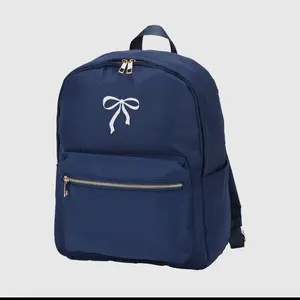 Navy Bow Backpack