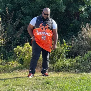 Shattered Backboard Reversible Jersey - Orange with "Stefanel 23" Design, Ideal for Sports Enthusiasts