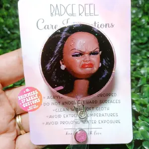Disgusted Doll Badge Reel - Brown Doll 2.0