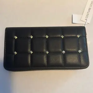 Couture Gems Black Quilted Zip-Around Wallet with Gold-Tone Pyramid Studs for Stylish Storage