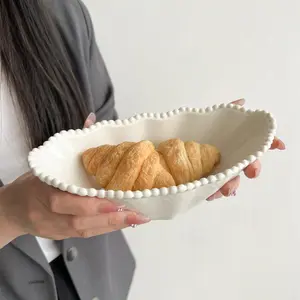 Aesthetic Stylish Ingot-Shaped Irregular Ceramic Bowl with Pearl Lace Edge - Kitchen Tableware for Home Use, Breakfast, Soup