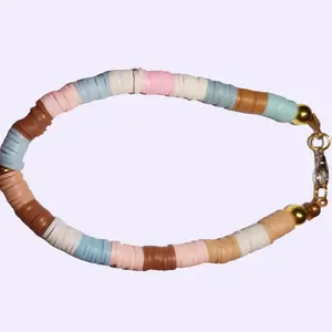 Petal Parade Bracelet - Elegant Playful Design with Pastel Earthy Disc Beads & Purple Flower Charm Gold Clasp 7-8 Inches Perfect for Everyday Wear