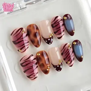 Tiger Tortie Handmade Press-On Nails | Short Almond Shape, 10pcs | Edgy Y2K Tiger Tortie Design | Pink Brown Tiger Stripe & Tortoise Marble & Dusty Blue Gradient & Gold Stud Accents | Reusable DIY Nail Kit for Women | Trendy Nails for Spring, Summer