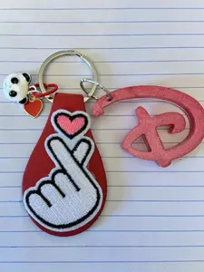 Heartfelt Panda Hug Keychain Adorable Panda with Red Heart & Affection Charm Perfect Gift for Loved Ones Functional and Delightful