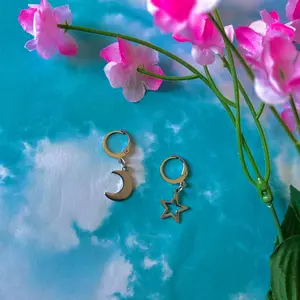 Star and moon Huggies | hair charms | Huggies | jewelry | multifunctional jewelry | hair accesories | star earrings | moon earrings | star hair clips | moon hair clips | Huggie earrings | comfy earrings | braid accessories | dread accessories |