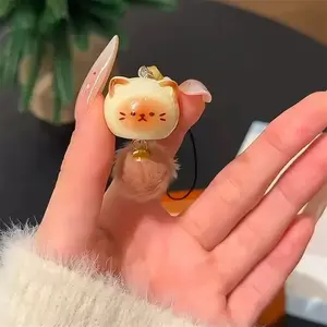 A cute plush cat pendant