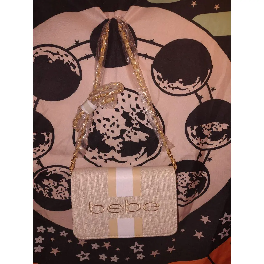 Bebe Women's Elegant Gold Chain Strap Handbag with Bebe Logo and Striped Design