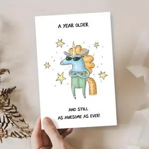Cool Unicorn Birthday Card - Sassy Blue Unicorn with Sunglasses Declaring 'A Year Older and Still as Awesome as Ever', Perfect for Trendy Celebrations