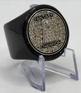 The FANTASY AWARD deCAPitator ring bottle cap & can tab opener cracks open your favorite beverage with a flick of the wrist.