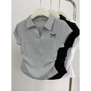 Women’s 3-piece set: casual fashion solid-color short-sleeve polo/T-shirt top with a pleated polo collar featuring butterfly pattern details (garmentary).