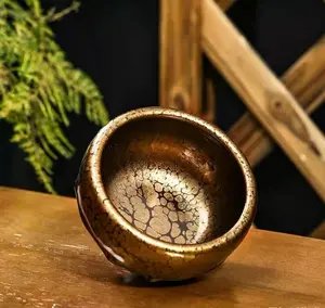 Handmade Jianzhan Cup – Golden Oil Droplet Pattern | Artisan Masterpiece